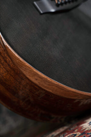 Timmercort-masterpiece-modern-black-acoustic-electric-guitar-lifestyle-2