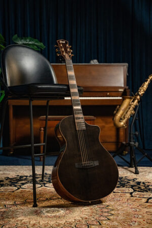 Timmercort-masterpiece-modern-black-acoustic-guitar-lifestyle-2